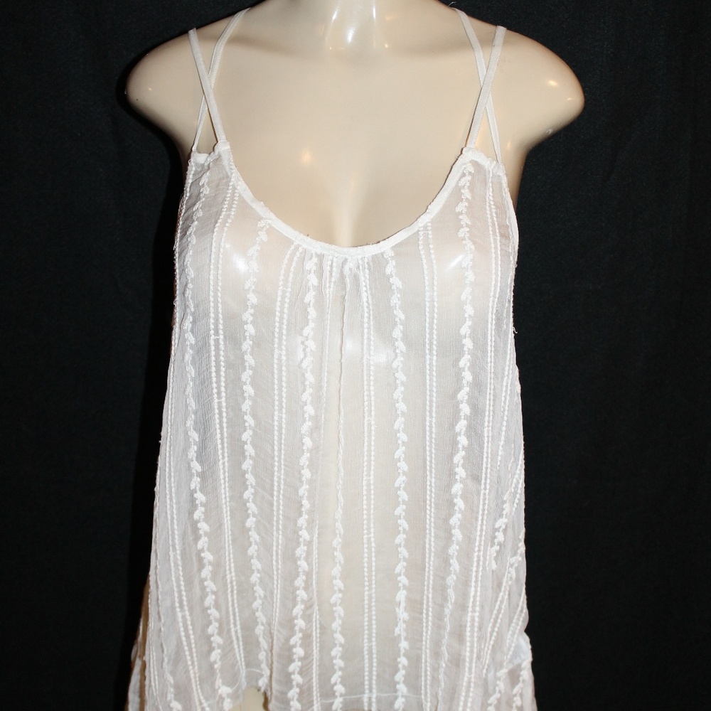 Chic and stylish Free People crochet trim top